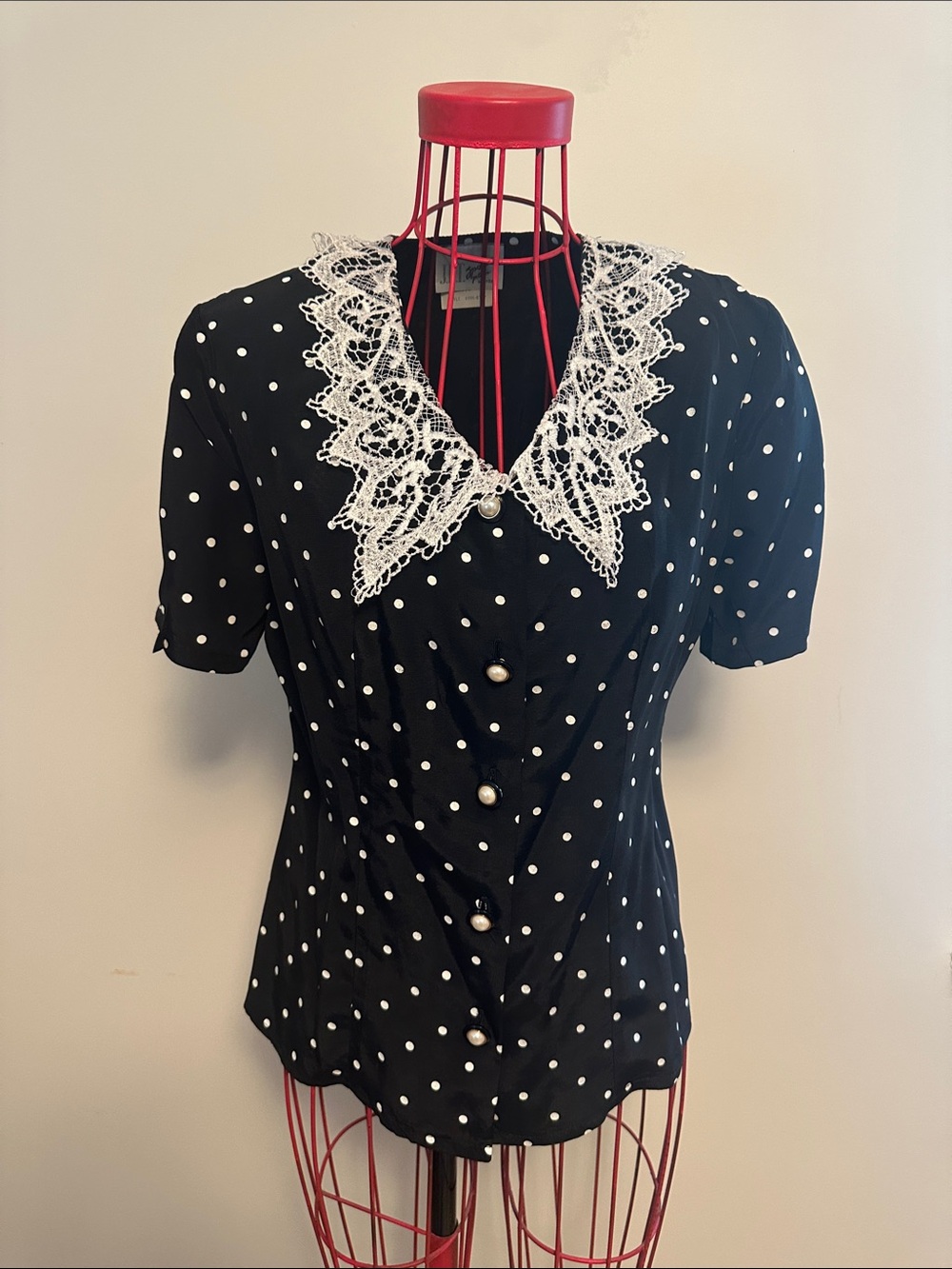Vintage-Inspired Black Polka Dot Top with Lace Collar